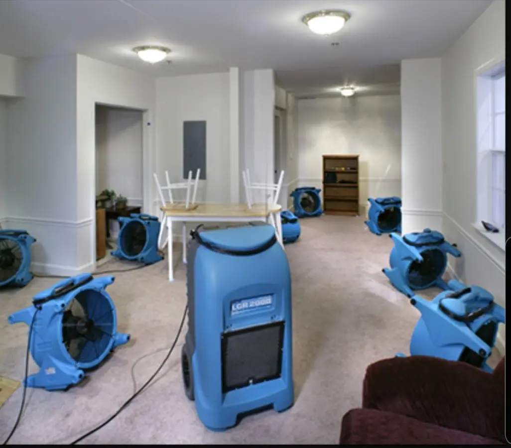 Air movers and dehumidifier setup for Water Damage Restoration in Westwego